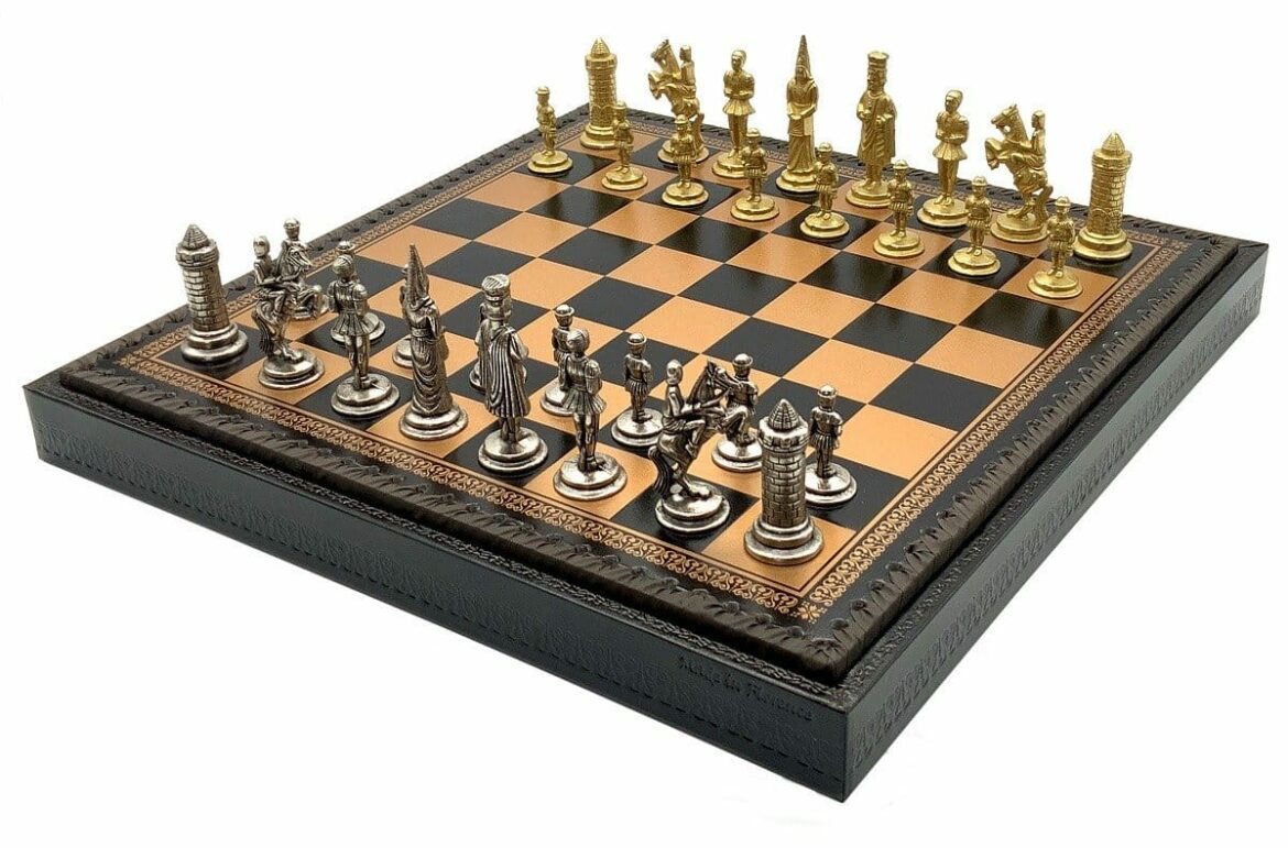 Black And Gold Chess Board And Small Medieval Chess Figures - The 